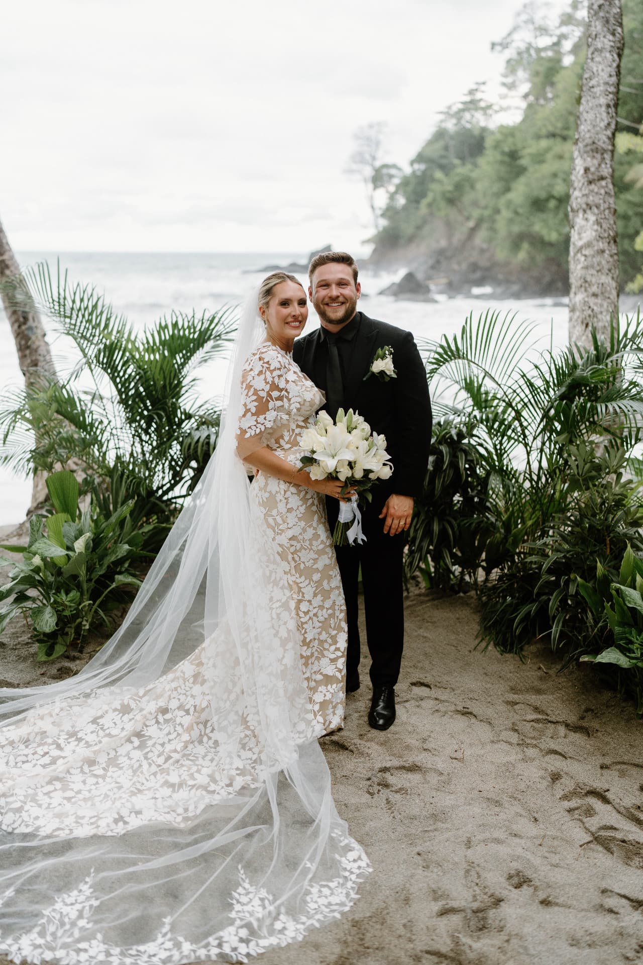 Mandy and Taylor after their beach ceremony in Manuel Antonio, Costa Rica
