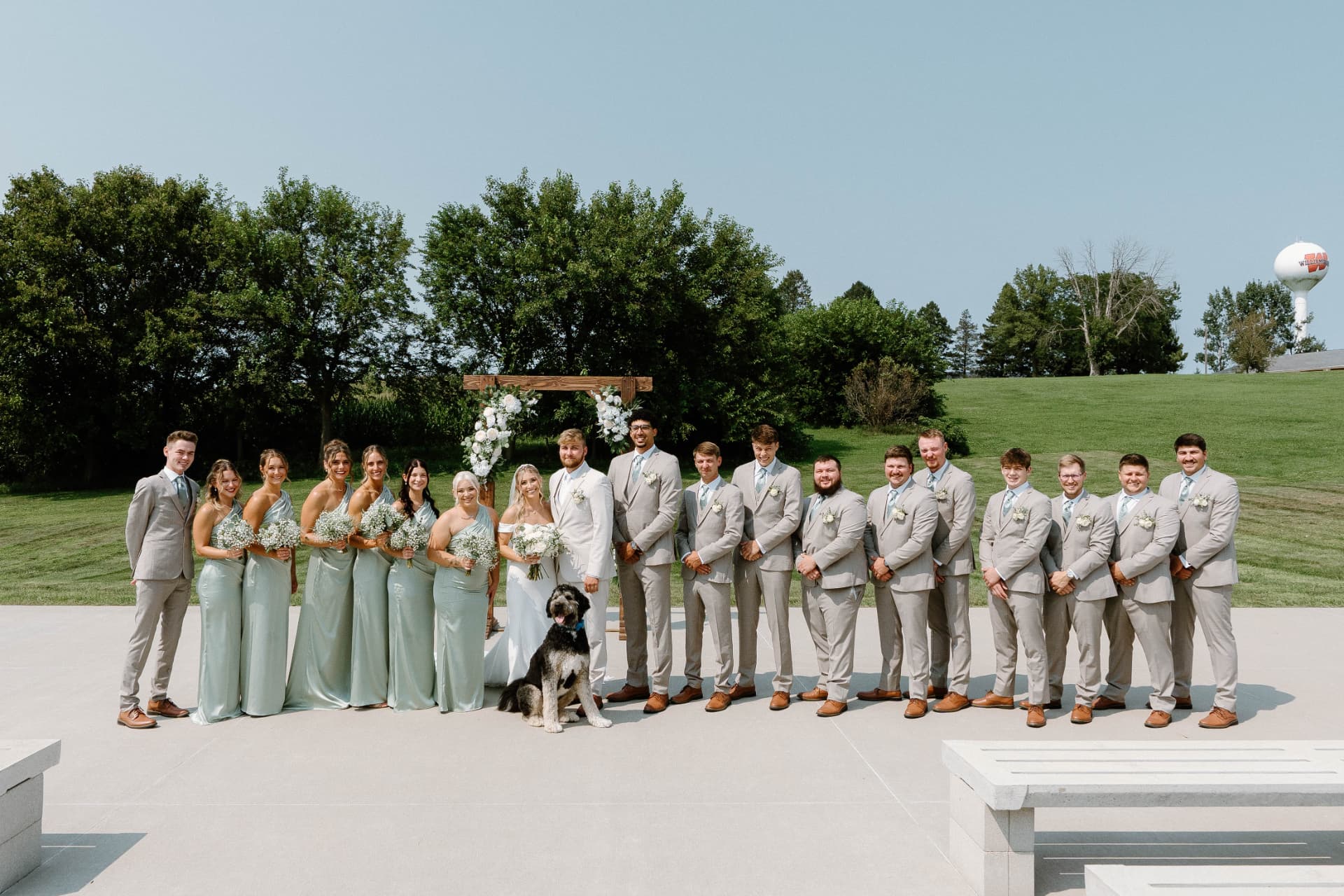 Austyn and Keegan's full wedding party on the ceremony patio