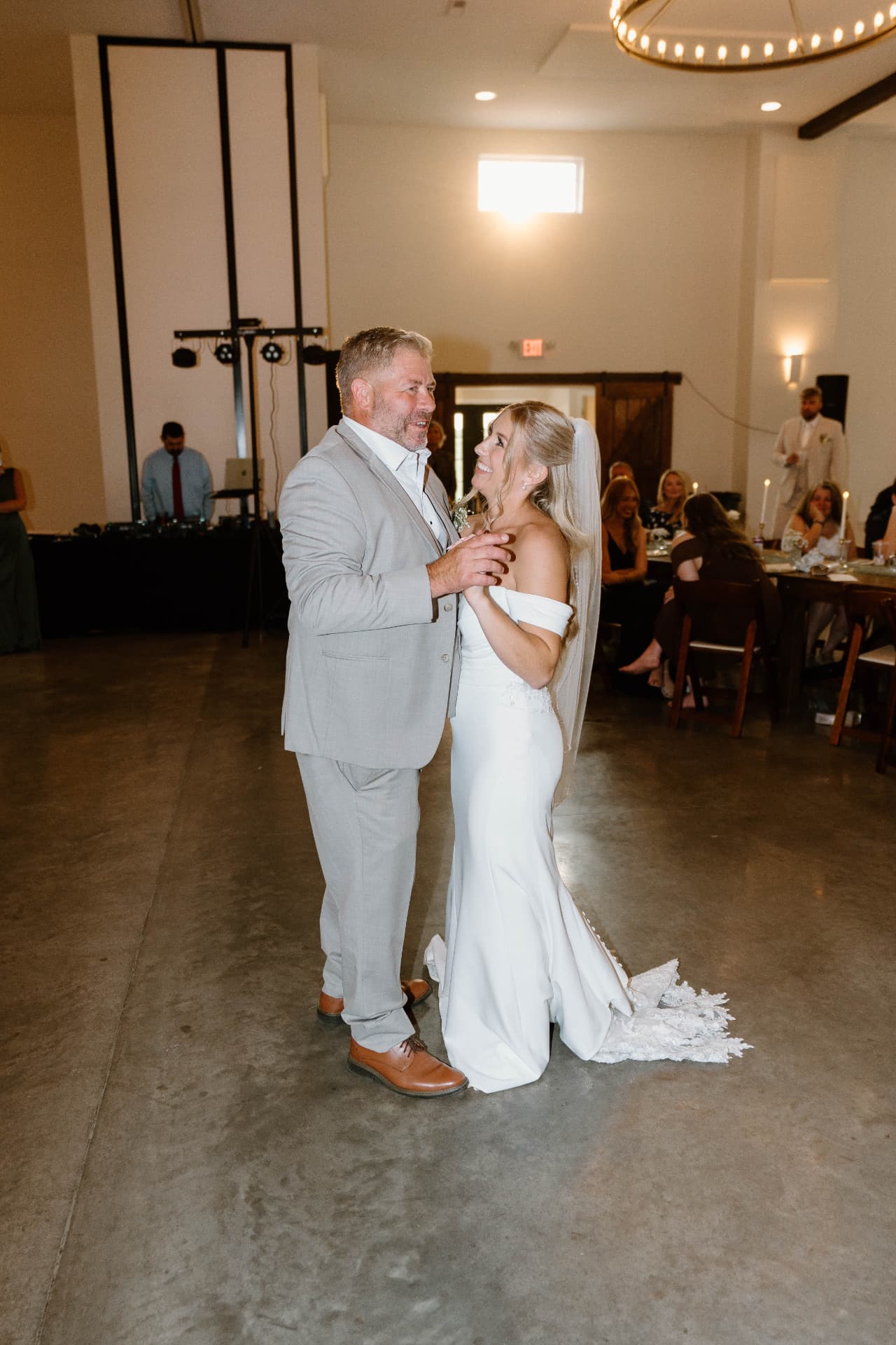 Austyn dancing with her father at the reception